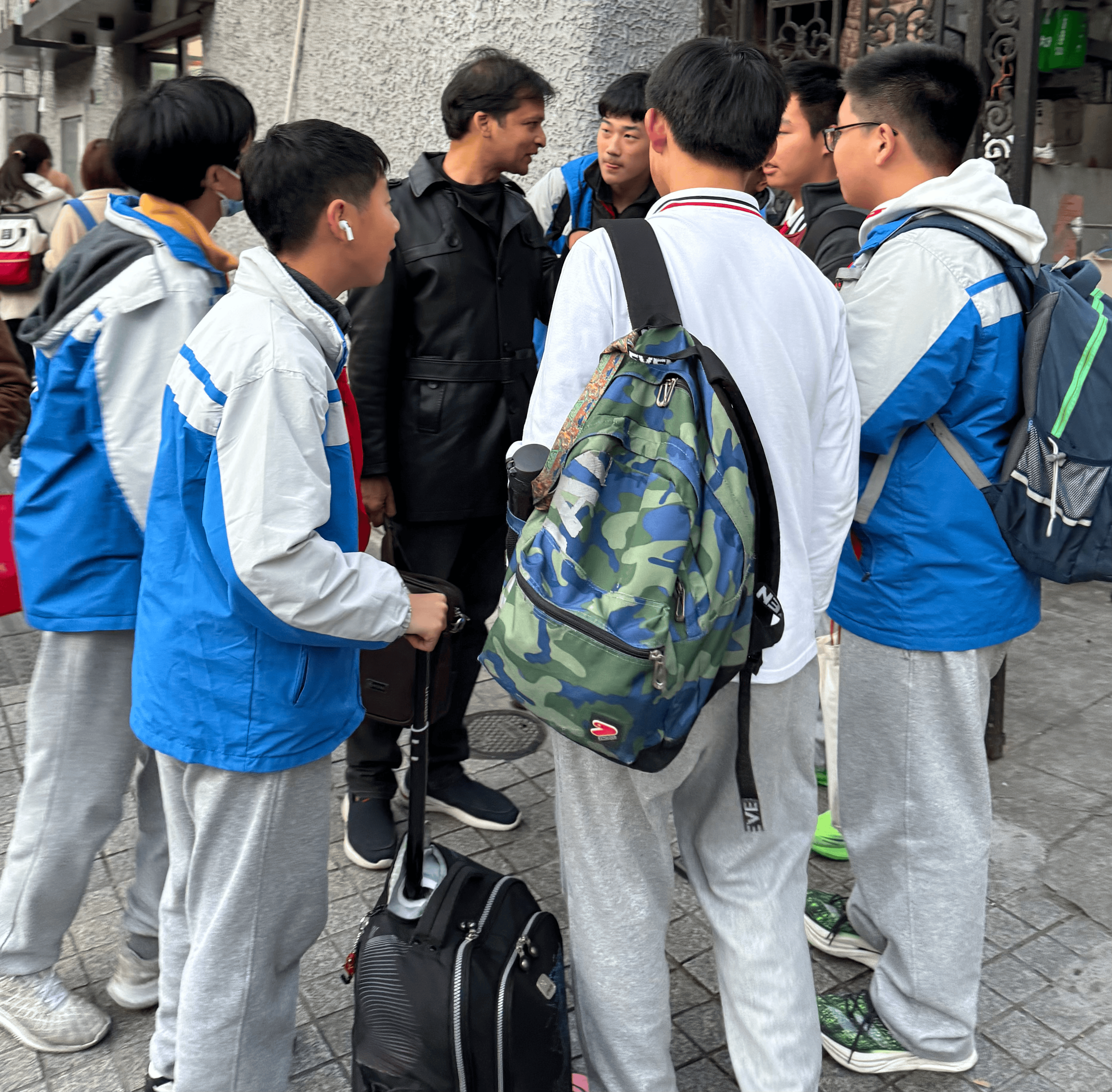 eQOURSE Engaging with Students During China Business Tour — China 2024. An eQOURSE representative interacting with a group of students during the China Business Tour 2024, gaining local perspectives…
